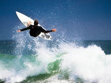 Surfer at Leo Carrillo State Beach