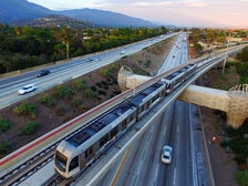 Metro Gold Line test train heads over eastbound 210 Freeway toward Arcadia Station