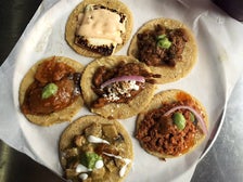 Taco sampler plate at Guisados
