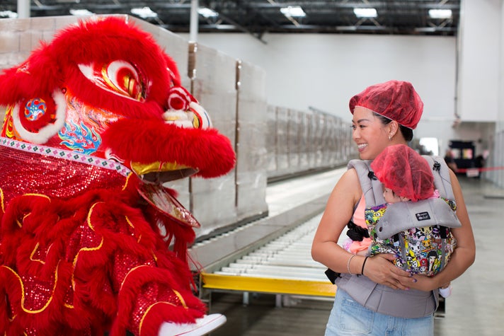 Lion dancer and new friends at Huy Fong Foods
