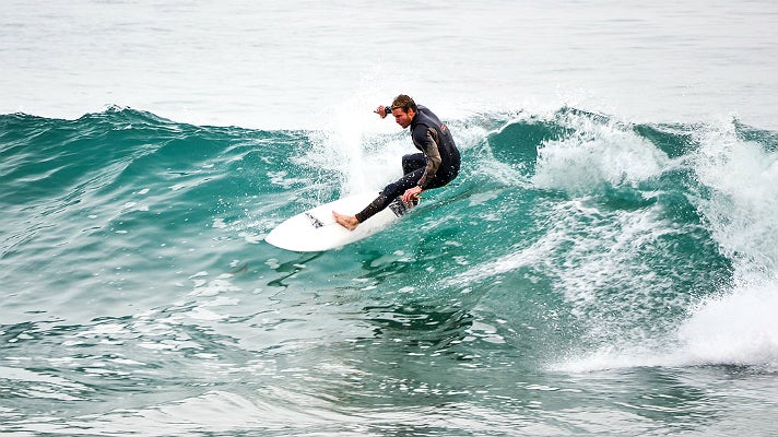 Surfer at Zuma Beach