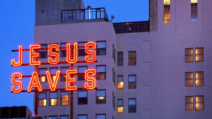  “Jesus Saves” neon sign at the Ace Hotel Downtown Los Angeles