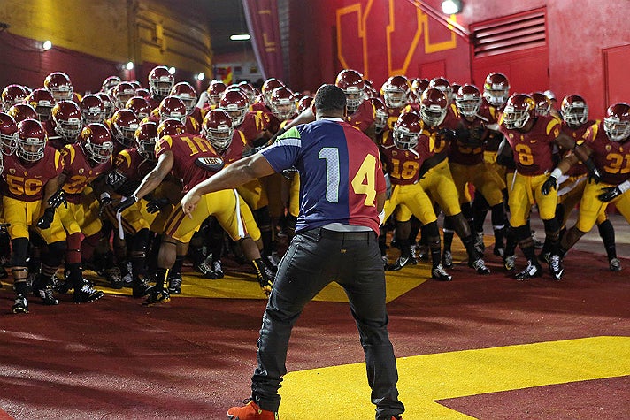 Malcolm Smith leads the USC Trojans out of the Player’s Tunnel at the L.A. Coliseum