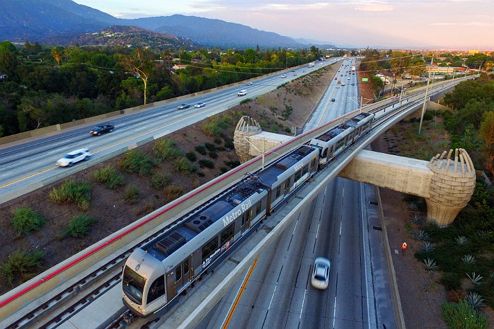 Metro Gold Line test train heads over eastbound 210 Freeway toward Arcadia Station