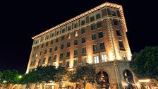 Culver Hotel exterior at night