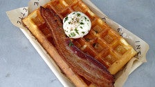 Waffle with Nueske’s bacon and poached egg at Dinette