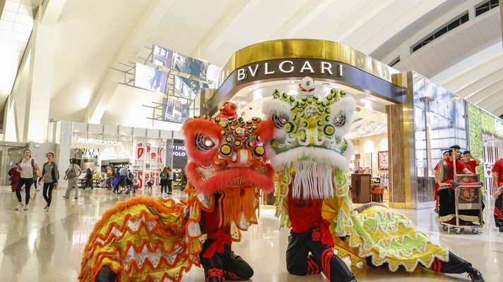 Lion dancers celebrate Lunar New Year at LAX Tom Bradley International Terminal