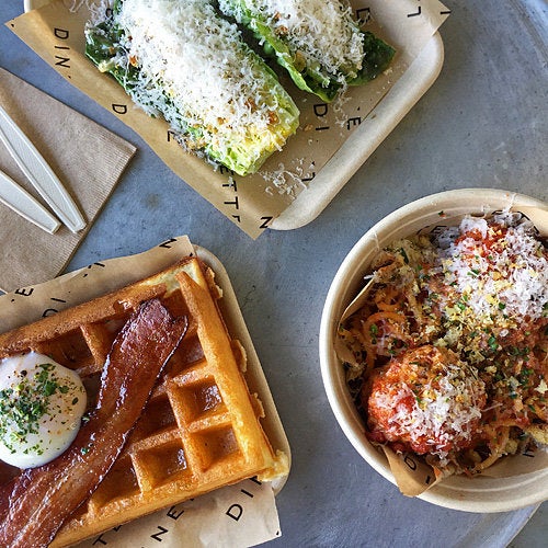 Waffle with bacon and poached egg, Caesar salad, spaghetti and meatballs at Dinette