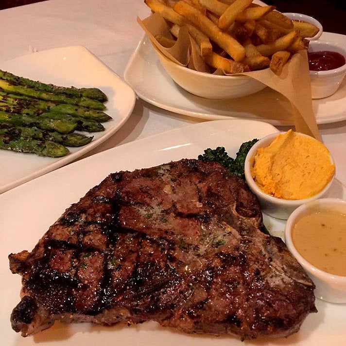 22-oz T-bone steak with au poivre sauce and compound butter at JW&#039;s Steakhouse