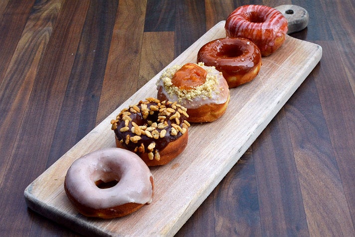 Flight of brioche donuts at The Strand House