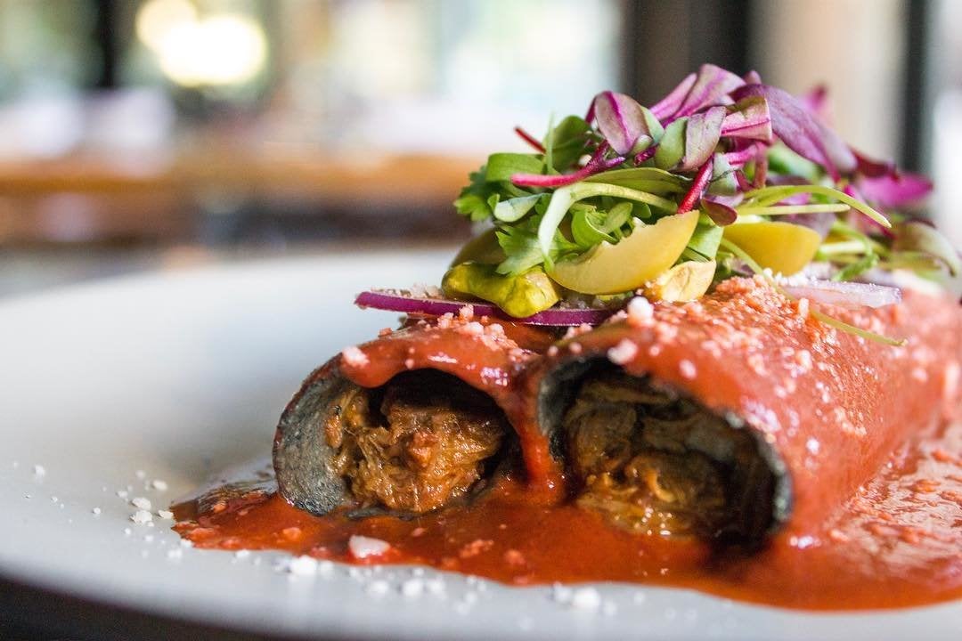 Duck confit enchiladas at Broken Spanish