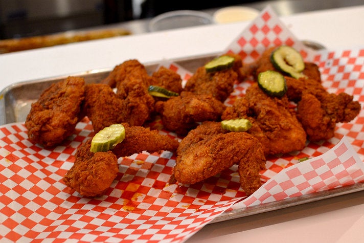 Batter&#039;s Box of a dozen fried chicken wings at Howlin&#039; Ray&#039;s