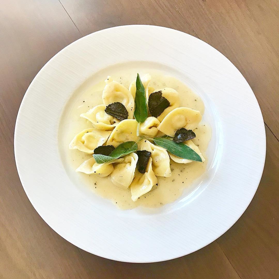 Homemade tortellini with ricotta, black truffle, butter &amp; sage at Toscana